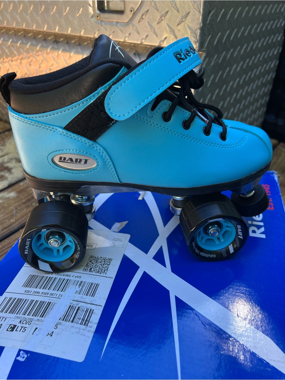 Riedel Dart Kids' Aqua Blue Quad Roller Skates